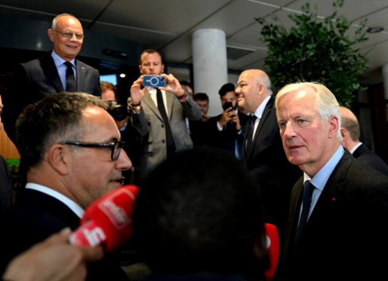 Edouard Philippe et Michel Barnier, le 11 septembre 2024, à Reims ( AFP / FRANCOIS NASCIMBENI )